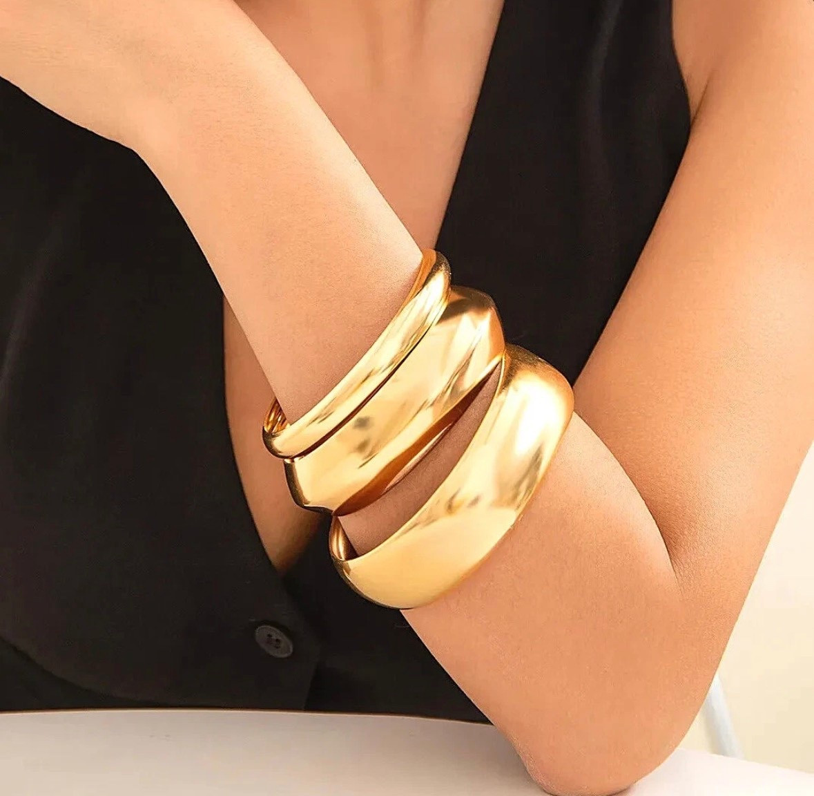 LOVE the idea of a chunky gold bangle for spring and summer - stack them or wear alone!!

Spring fashion, summer fashion, jewelry, statement bracelet, spring accessories, vacation outfit, jewelry, statement bracelet 



#LTKOver40