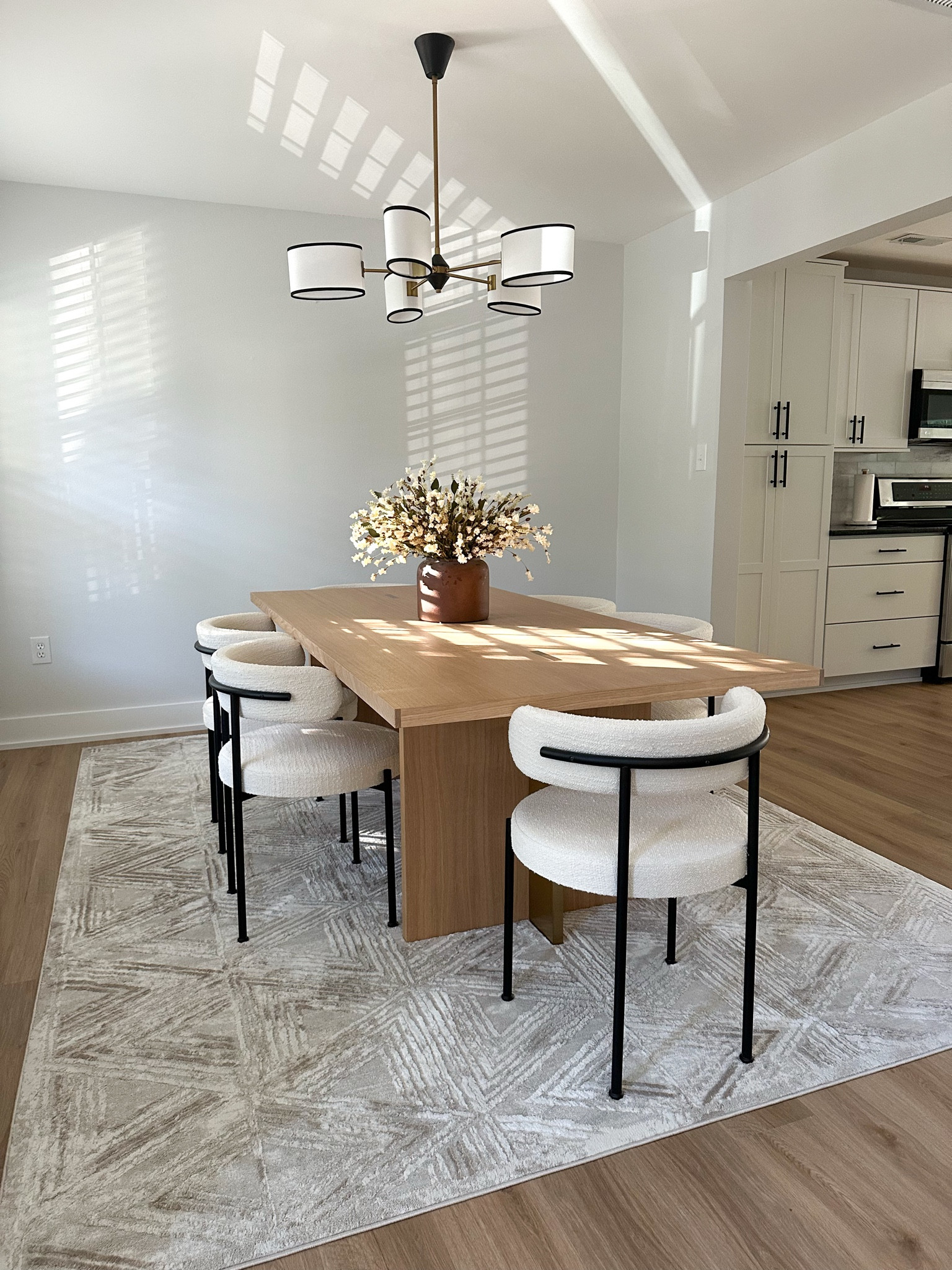 CB2 chairs on sale!! 

Bazaar Zen Cream 8 ft. x 10 ft. Abstract Area Rug

Soho Home Dawnbarn Chandelier 

Crate & Barrel Paradox dining table (sold out) linking similar 

CB2 INESSE BOUCLE IVORY DINING CHAIR. Linking similar chairs from Amazon for a more affordable option 

Also linked the chair covers that we use for holidays and gatherings 



#LTKHome #LTKCyberWeek #LTKSaleAlert