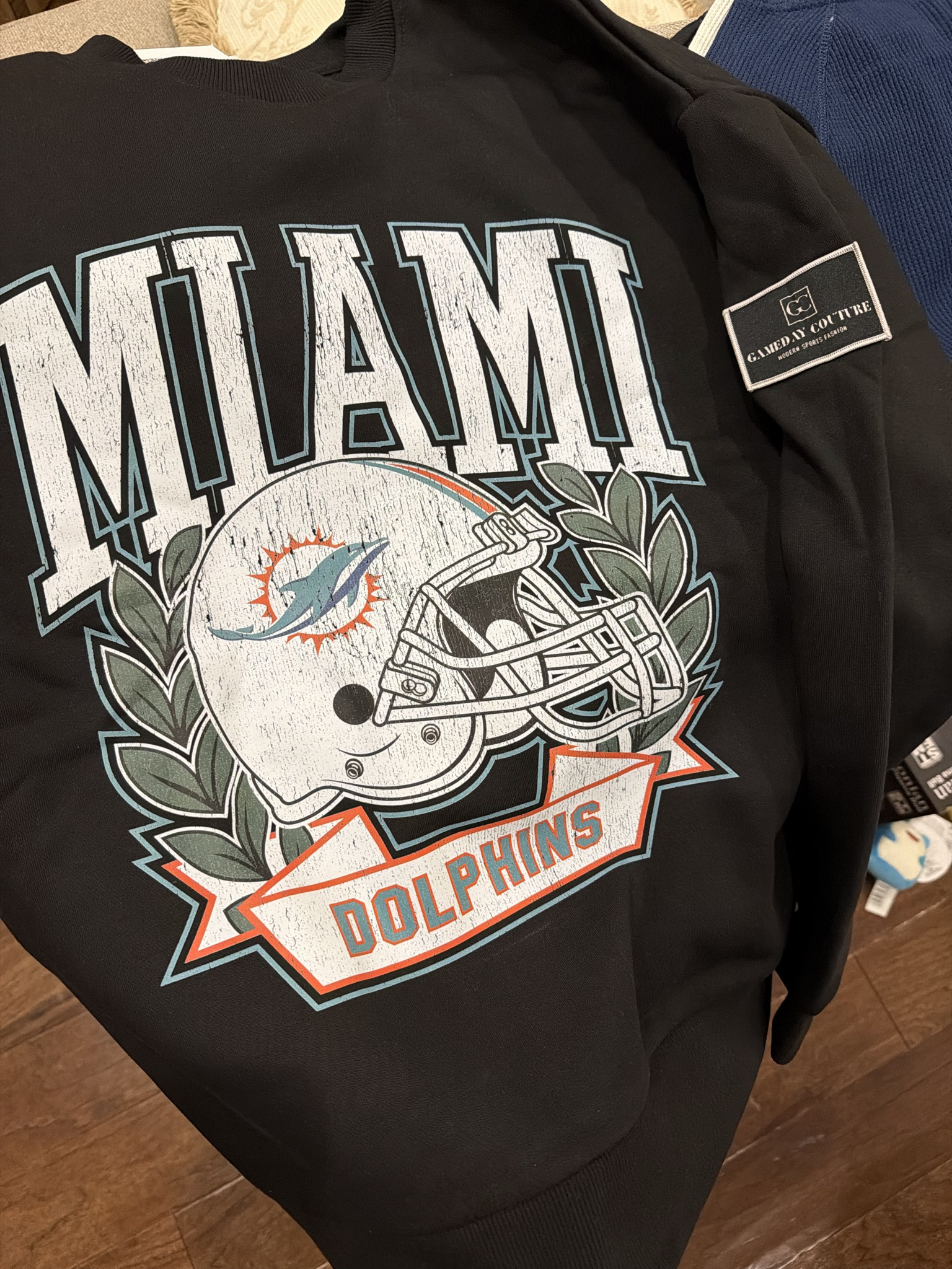 Game day style, but make it extra special! 

This Women’s Gameday Couture Black Miami Dolphins Oversized Victory Lane Black Label Premium Fleece Sweatshirt was a Christmas gift from my mom, and it’s easily going to become one of my favorite pieces, I just know it!

The oversized fit makes it perfect for cozy layering, whether you’re headed to a game, watching at home, or running errands on game day. The premium fleece fabric is soft, warm, and high quality, making it an easy go-to for Miami Dolphins game day outfits. 

A must-have for any Dolphins fan who loves comfy, elevated fan gear!

#LTKSeasonal #LTKHoliday #LTKGiftGuide