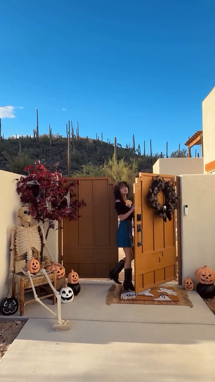 Halloween front porch inspiration. We use this side gate a lot so I had to add some Halloween fun to it with Mr. bones and terracotta pumpkins  

#LTKHalloween #LTKSeasonal