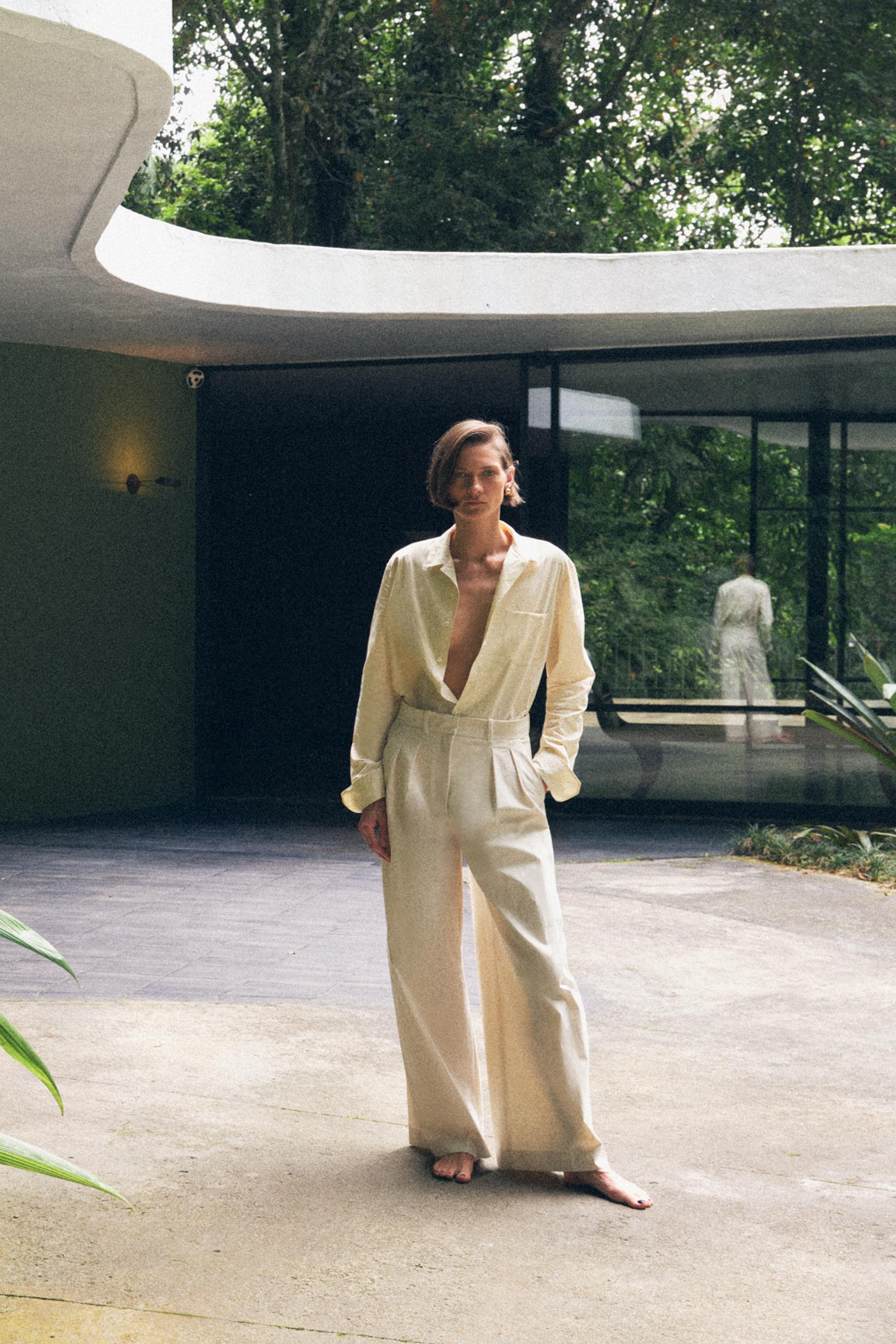 ZARA WOMAN COLLECTIONPants made of cotton yarn. Mid-rise waist with belt loops. Side pockets and ... | Zara US