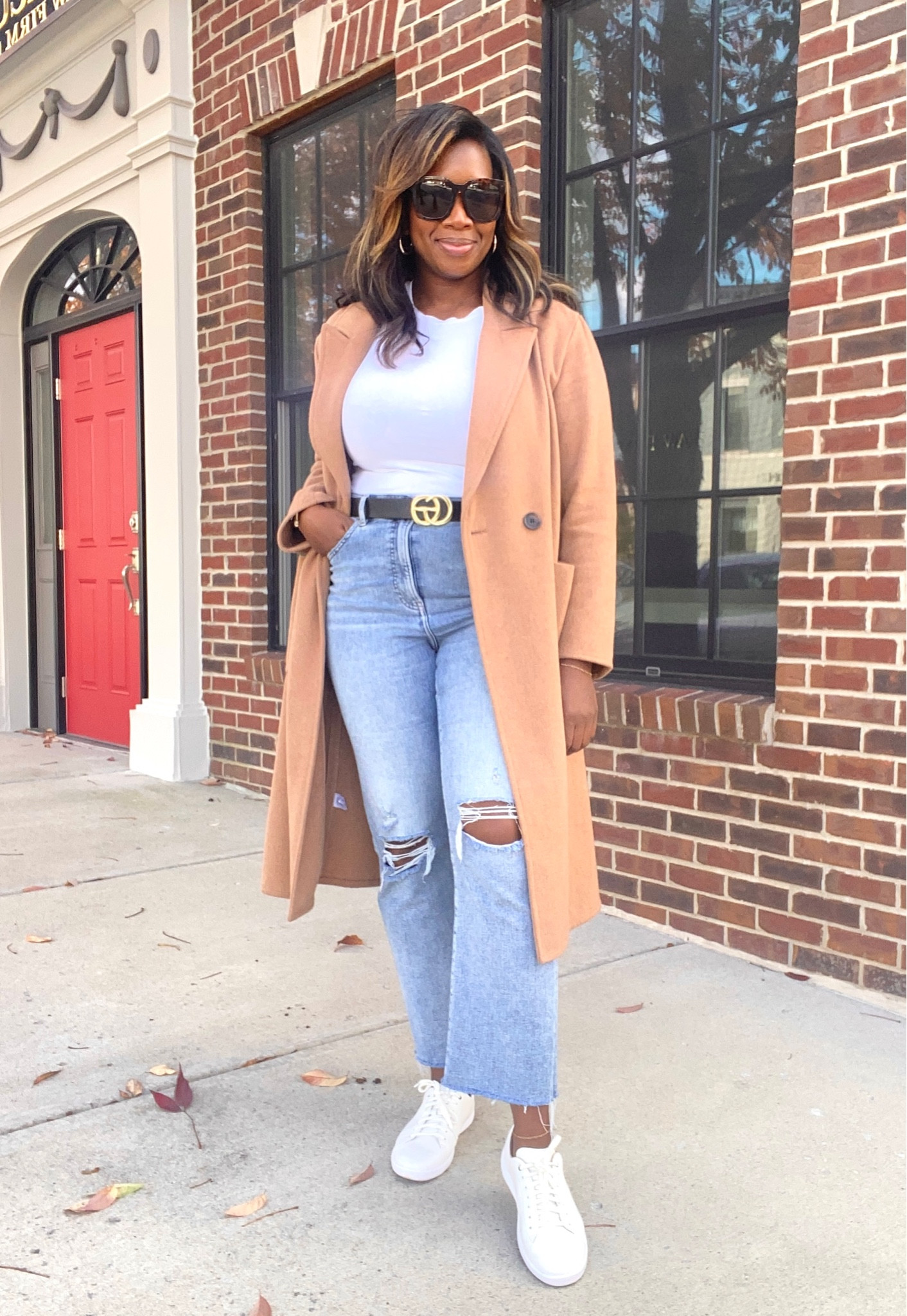 Long camel wool coat, straight leg denim, white tshirt, and white sneakers for fall 

#LTKSeasonal #LTKstyletip #LTKmidsize