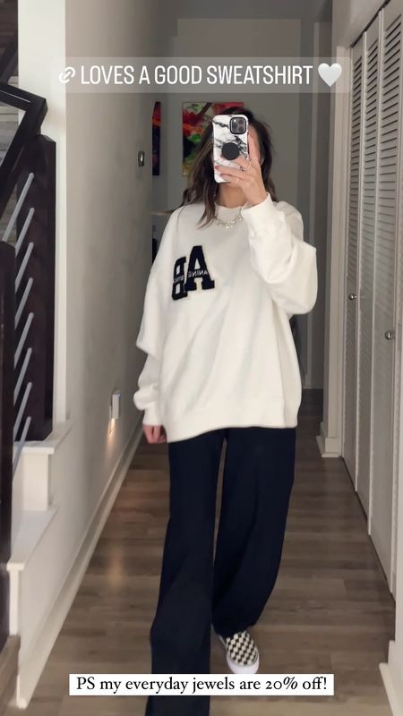 Casual spring outfit 🤍 What I wore running errands.  Love this new Anine Bing sweatshirt—it’s so soft! Styled with trousers and my favorite Vans sneakers that look great with everything. My chunky silver necklace is 20% off, run! 

Sweatshirt, trousers, white and black sneakers, neutral sneakers, Vans sneakers, Anine Bing, silver necklace, sale, The Stylizt 



#LTKShoeCrush #LTKSaleAlert #LTKStyleTip