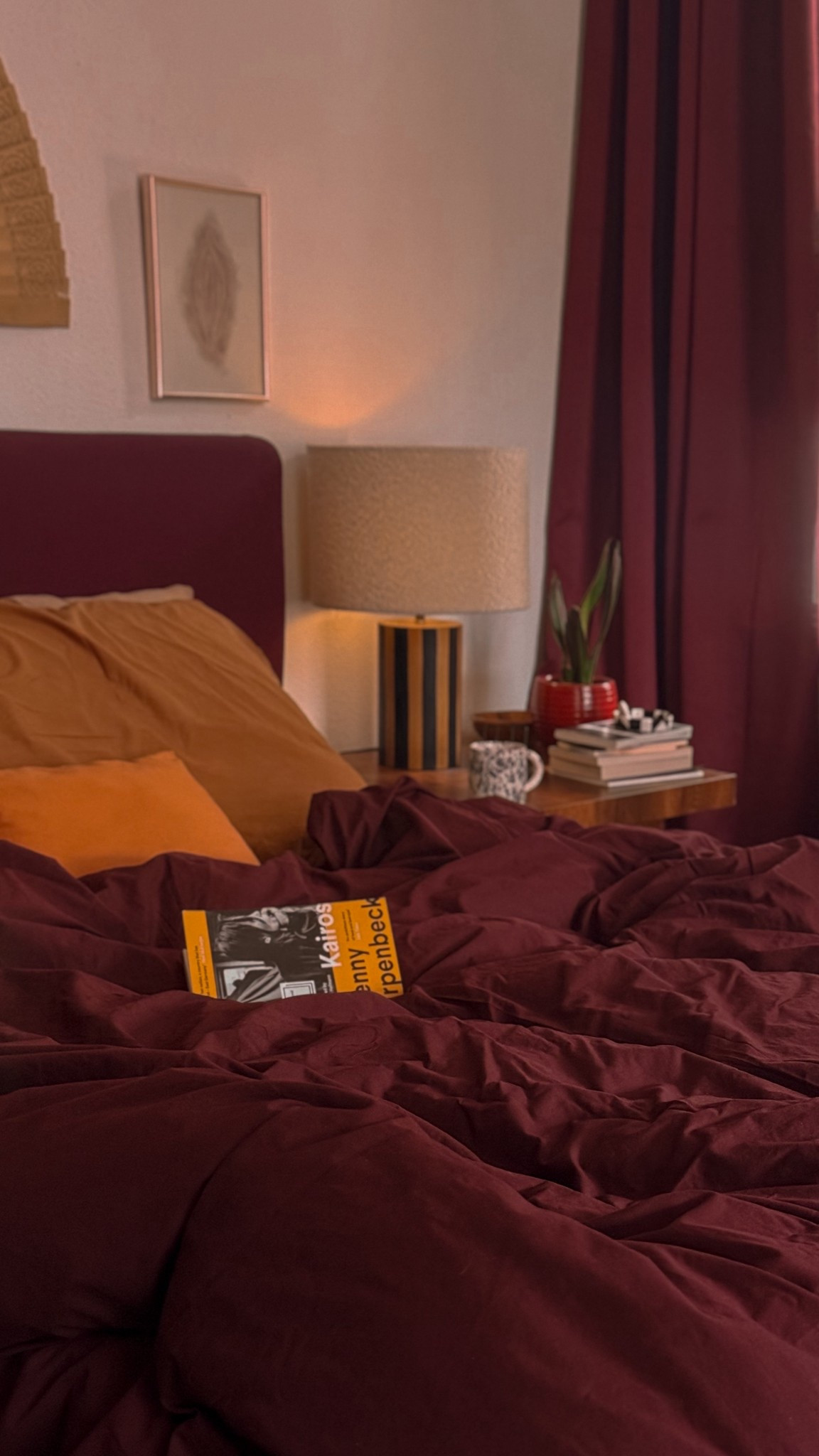 Warm cozy bedroom • burgundy • earthy tones 