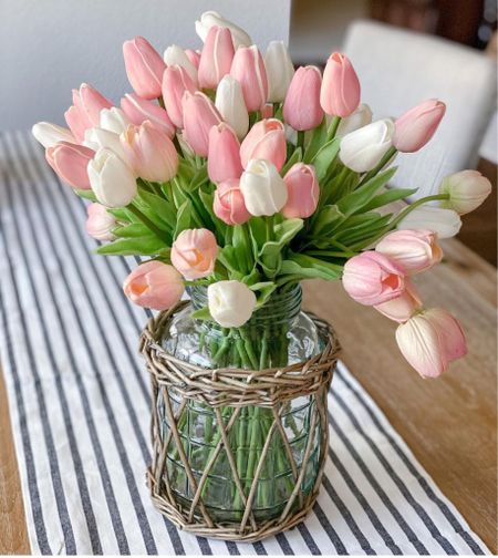 These faux tulips are my favorite spring decor item. They’re so cute in any room. I even put them inside a tea kettle on the stove top  

#LTKSpringSale #LTKhome #LTKSeasonal