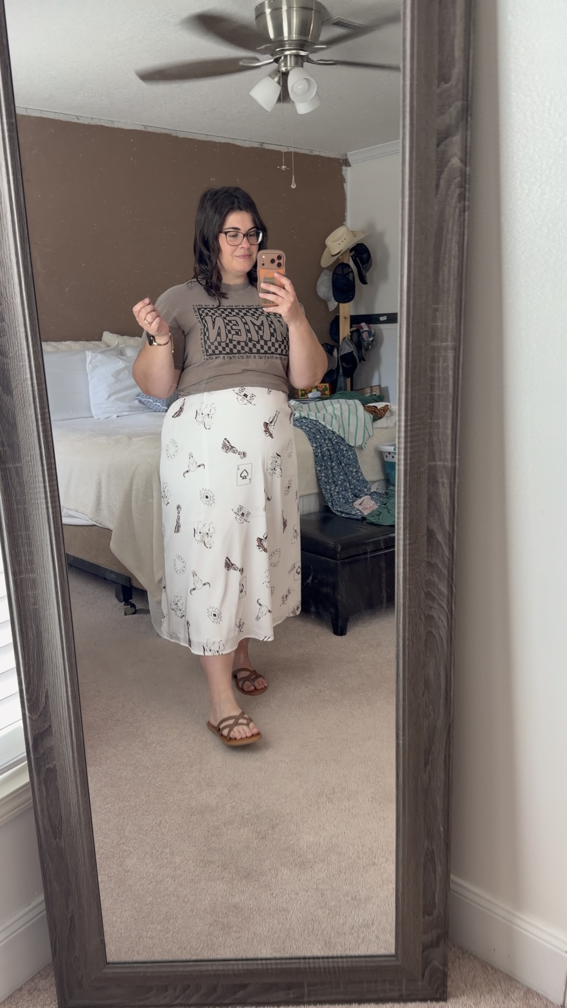 Mixing a casual graphic tee with a printed skirt for an effortless everyday look
Little waist definition makes all the difference

#LTKMidsize #LTKootd