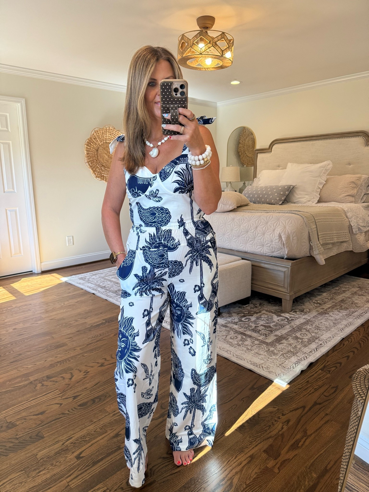 Vacation mode: ON 🌴💙 This blue-and-white printed jumpsuit is the kind of effortless outfit that makes getting dressed on vacation easy. Lightweight, flattering, and yes… it has pockets! ✈️☀️

#LTKTravel #VacationStyle #ResortWear #SummerStyle #VacationOutfit