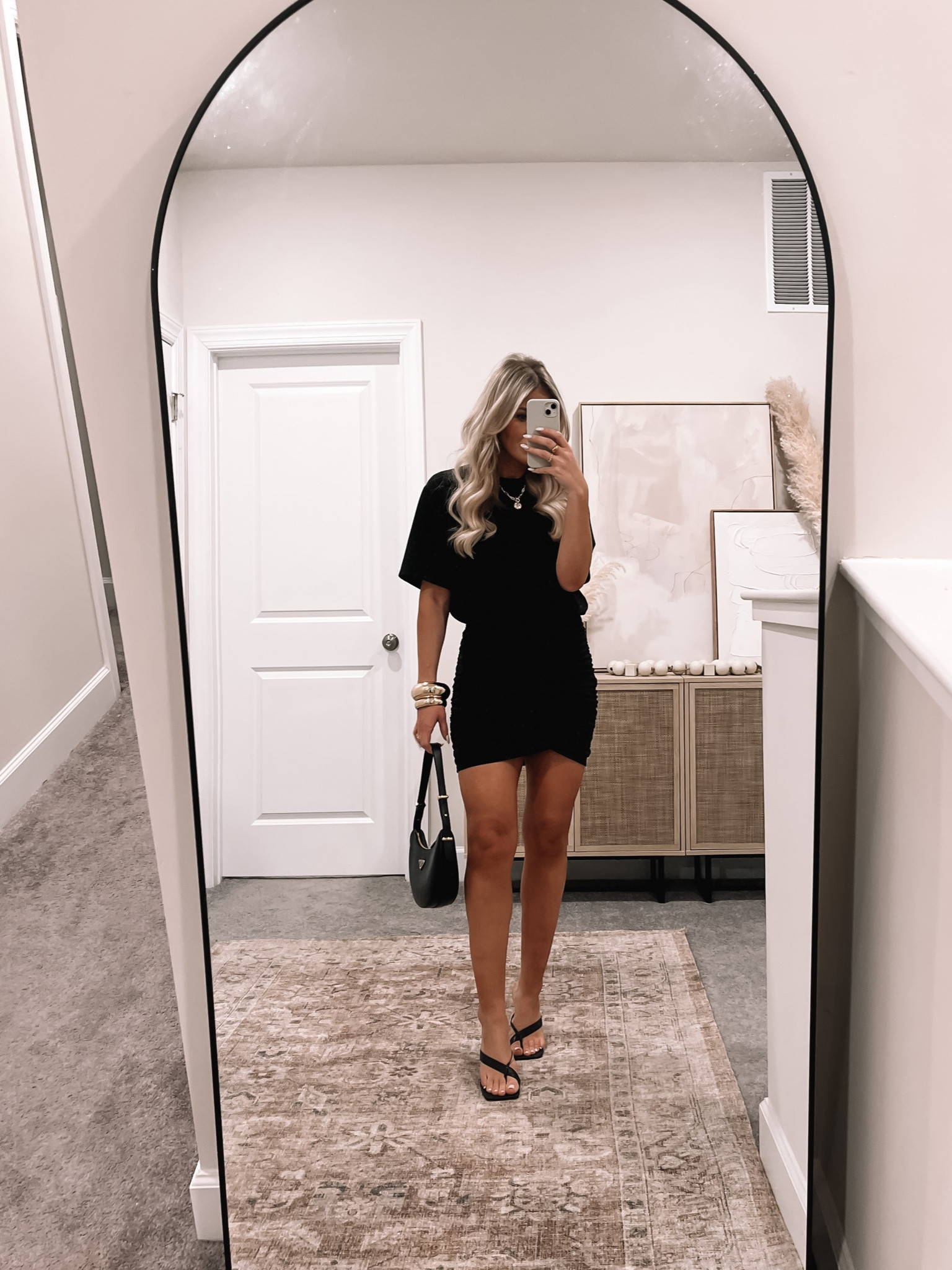 Black mini dress! Loved the rouching detail on the bottom half of this dress. Wearing size small and it fits TTS!

#LTKfindsunder100 #LTKSeasonal #LTKSpringSale