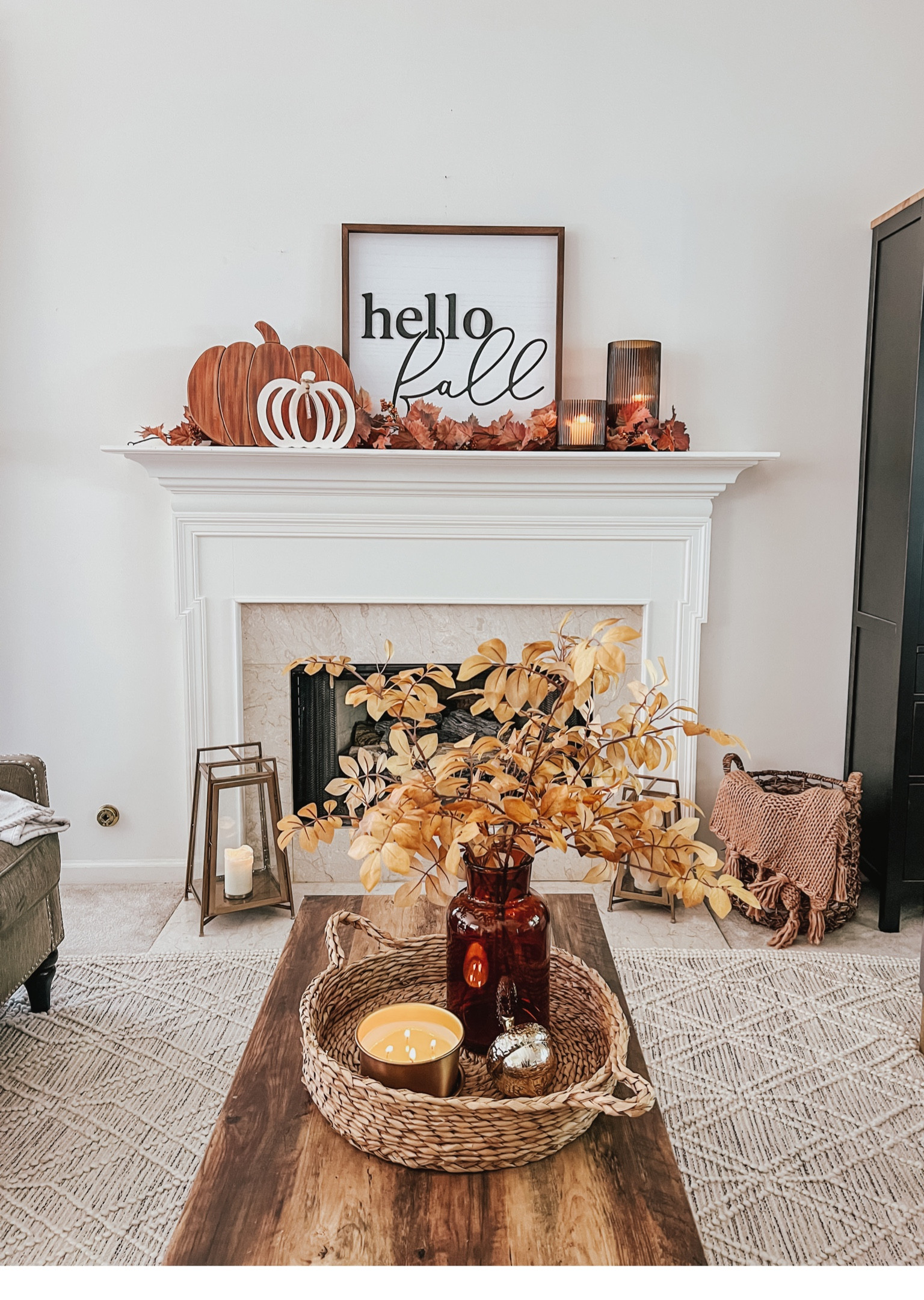 Fall fireplace decor

Autumn living room | faux stems | copper lanterns | glass vase | scented candle | wicker tray | hello fall | wood sign | pumpkins 



#LTKSeasonal #LTKhome