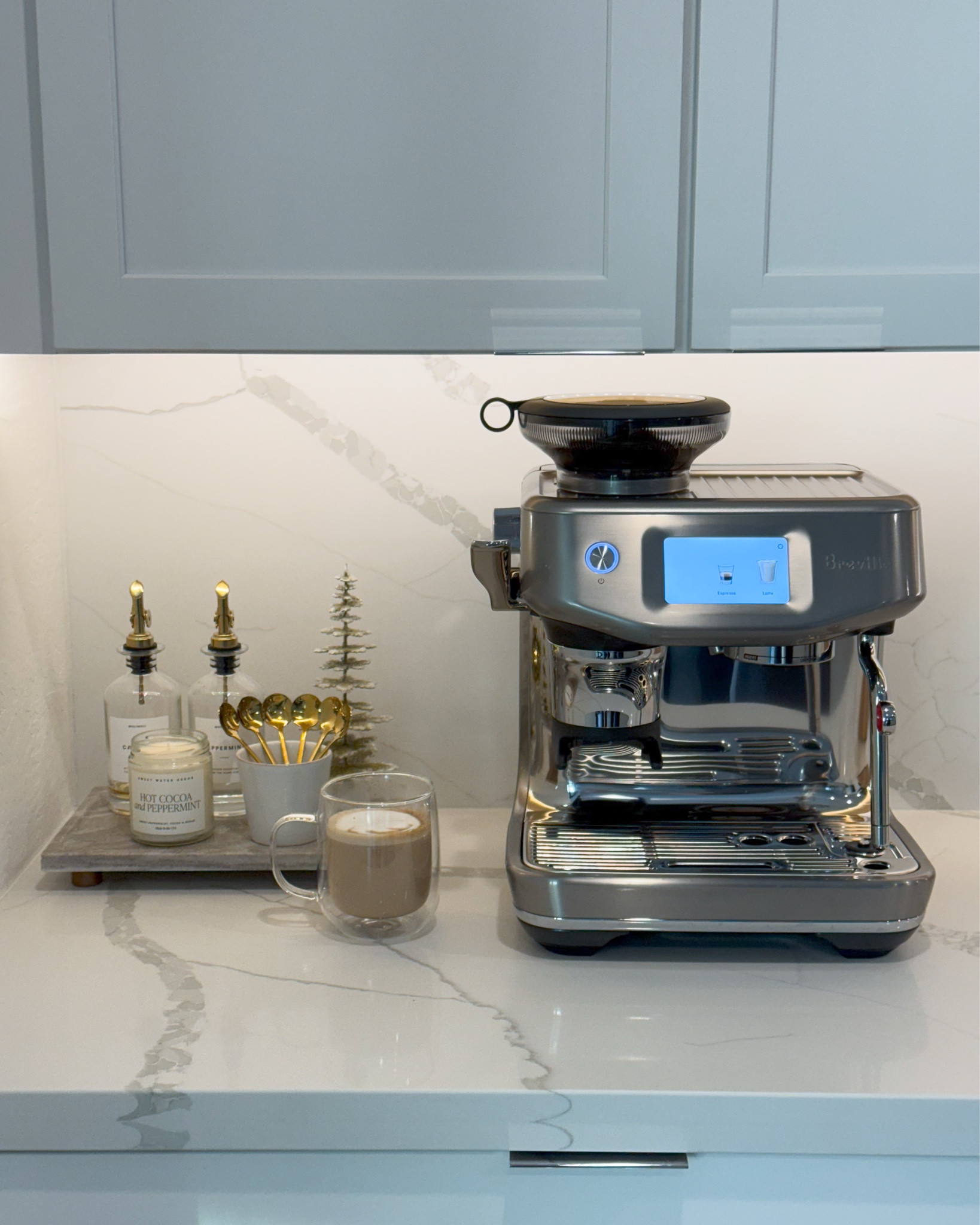 kitchen countertop coffee bar essentials || breville espresso machine, marble tray, syrup bottles, syrup dispensers, ceramic mug, coffee spoons, gold coffee spoons, christmas decor, candle, soy candle, double wall glass coffee mugs, glass coffee mugs, coffee mugs

#LTKHome