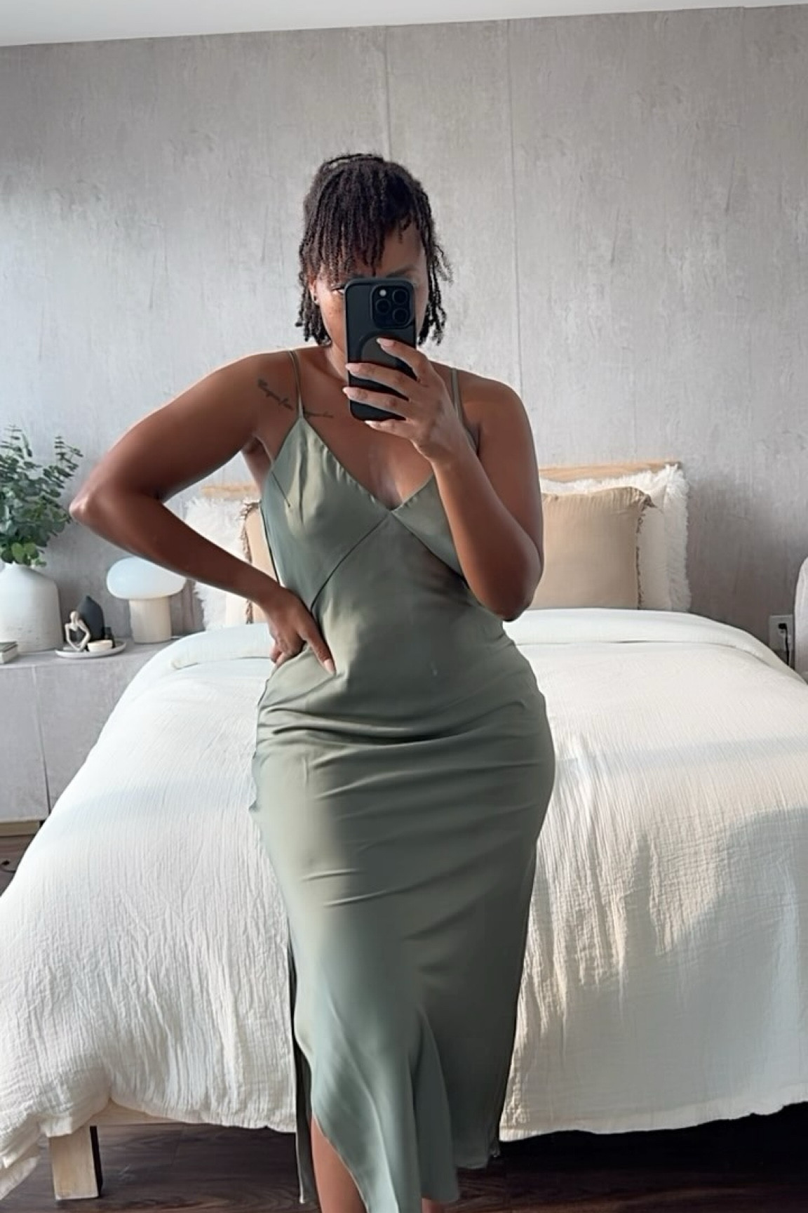 A little try on or whateva …  I went into Target to grab some vitamins and I walk out with this 🤦🏽‍♀️. 
In this season of my life … I have really fell in love with dresses …when I’ve always been a trouser Gworl…
I’ve been obsessed with green lately and I could not believe that I was finally able to fit a slip dress that fits my waist and hips at the same time. This @target A New Day dress has a little stretch to it 🙌🏽This shade of green  is such a current mood for me right now! 
 
Dress: @target @targetstyle 

Soft minimalism • Minimalist Style • minimalist Ootd