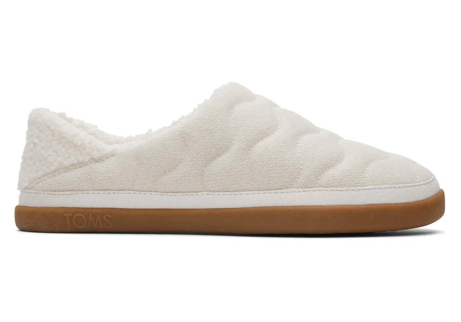Women

Ezra Light Sand Quilted Convertible Slipper | Toms Americas