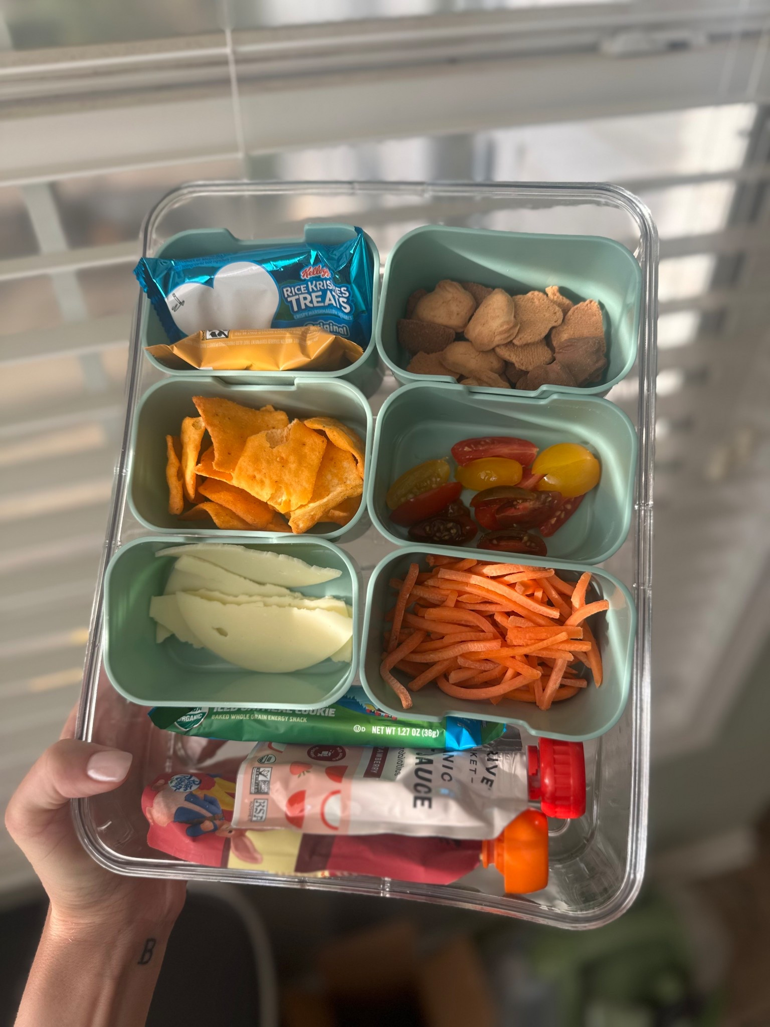snackle box! this was so easy to throw snacks together for my toddler 🧃 comes in 3 colors- sage green (pictured here), pink, & taupe!

#LTKKids #LTKFamily #LTKSeasonal