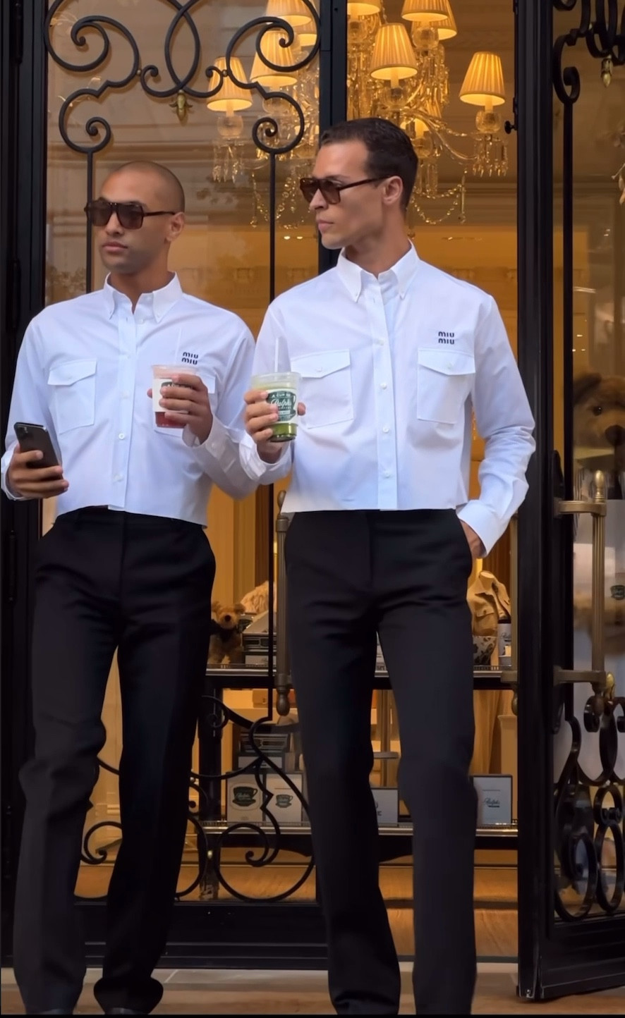 Miu Miu look 

chemise courte blanche, chemise en popeline à logo brodé, chemise crop blanche, pantalon droit noir, pantalon costume noir, bottines fendues noires en cuir 

#LTKstyletip #LTKshoecrush #LTKmens