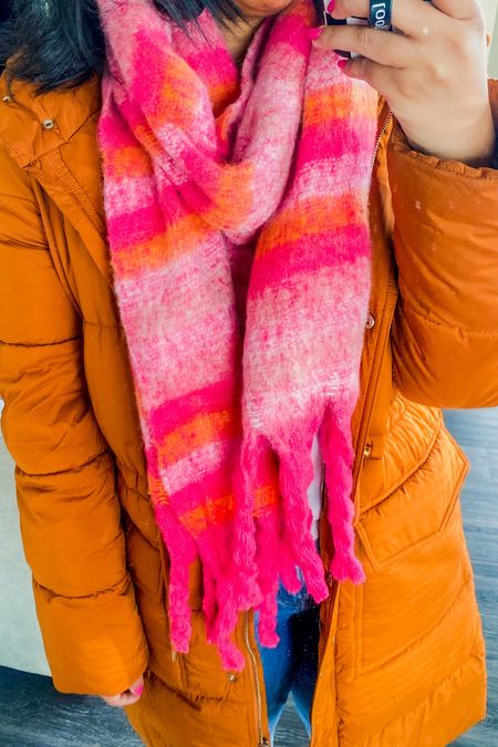 Bundled up in an orange puffer coat and a coordinating pink and orange scarf. // Amazon finds, colorful winter style, pink scarf, striped scarf, pink fuzzy scarf, orange scarf

#LTKfindsunder50 #LTKfindsunder100 #LTKstyletip