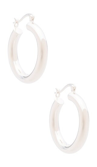The M Jewelers NY The Large Ravello Hoops in Metallic Silver. | Revolve Clothing (Global)
