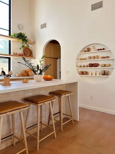 Neutral kitchen decor - Leather counter stools - ceramics collection - wood bowls - kitchen decor 

#LTKunder100 #LTKhome