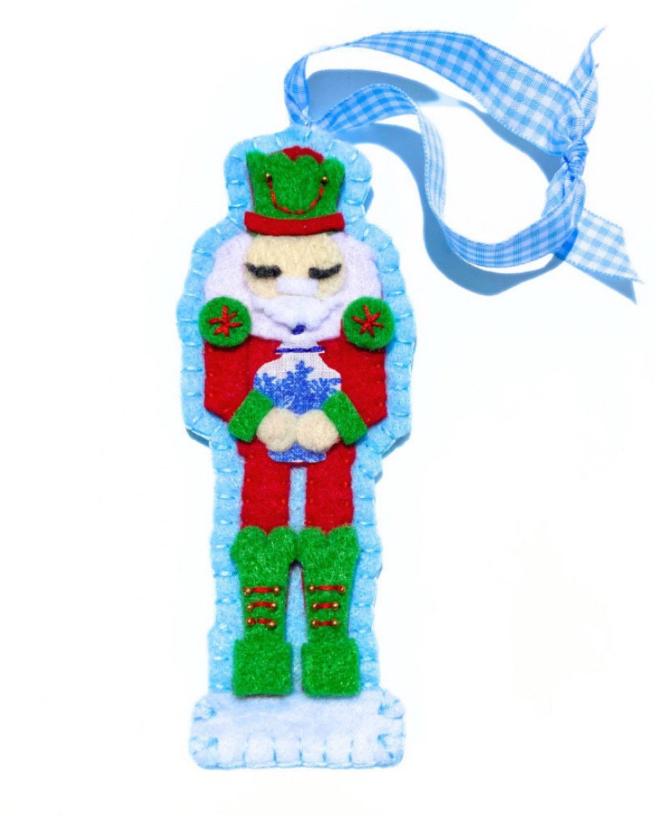 Love this chinoiserie inspired felt nutcracker ornament! Take a look at some ornaments I’ve been eyeing.. all great to add to your tree or give as gifts. Better start buying now!

#LTKSeasonal #LTKGiftGuide #LTKHoliday