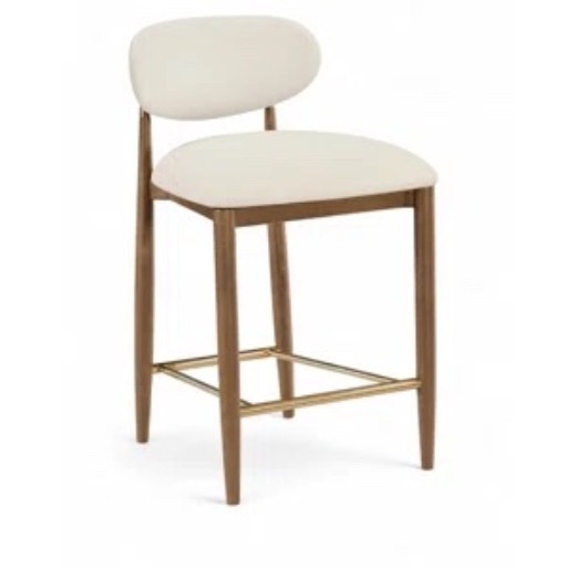 This ivory vegan leather bar stool from Wayfair has such a clean, elevated look. I love the softly rounded upholstered seat and back, warm wood frame, and brass-tone footrest for a kitchen island or breakfast bar. It’s currently marked 10% off and included in Wayfair’s Bundle & Save offer. #WayfairFinds #BarStool #KitchenIsland #CounterStool