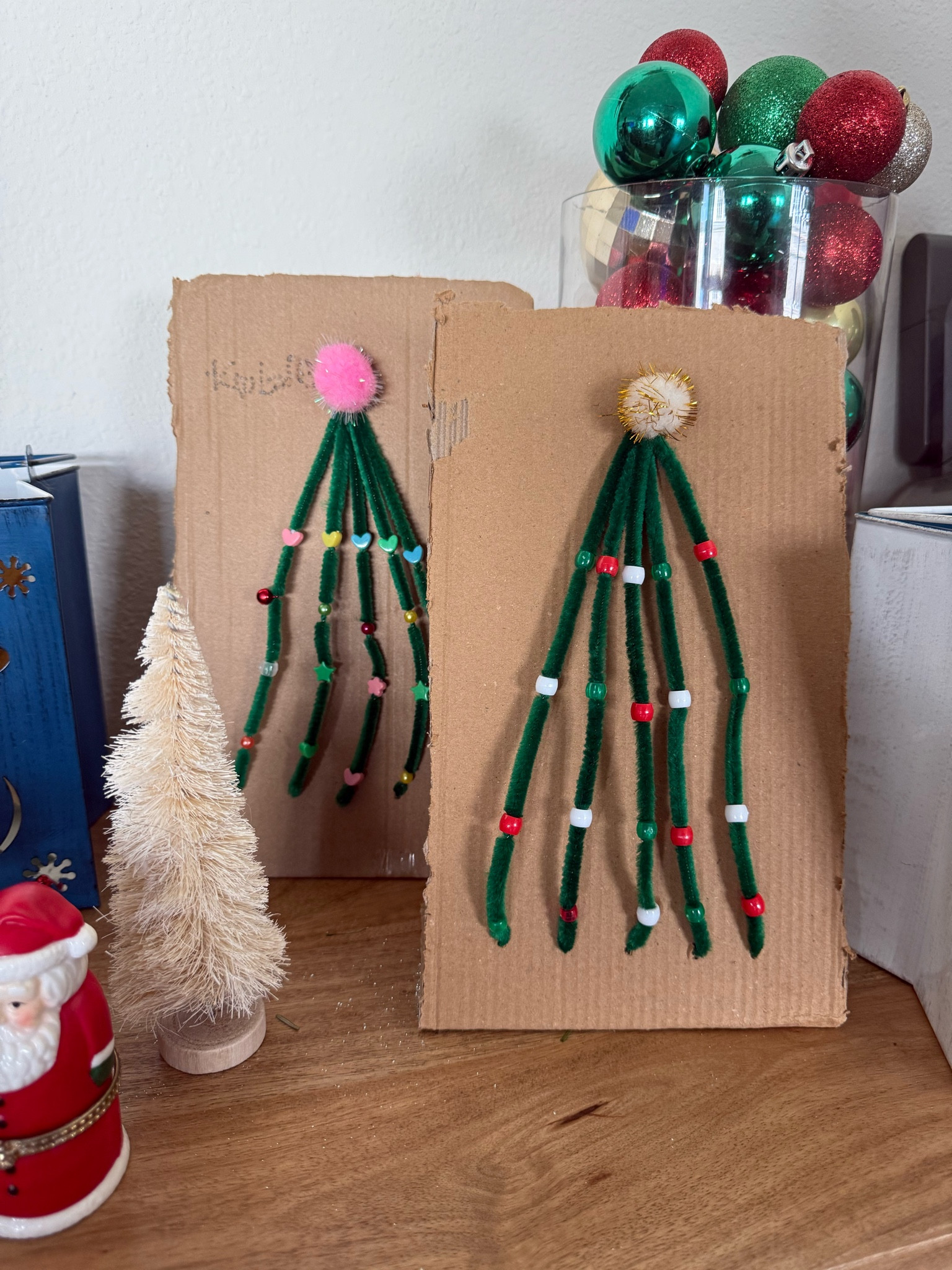 DIY Cardboard Christmas Tree 

Find easy kids Christmas DIYs on my blog! 
Mamallamallama.com

#LTKFamily #LTKHoliday #LTKSeasonal