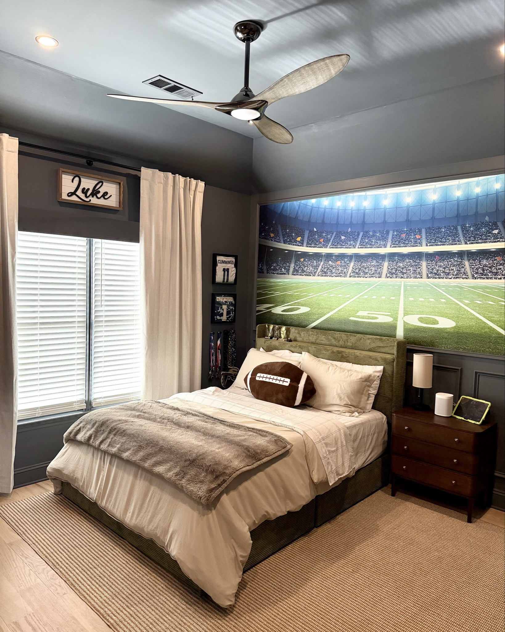 Welcome to my sons dream room! 🏈 From custom wall details and cozy layering to perfectly curated lighting and storage for all the game-day gear, this football room was designed to be both stylish and functional for everyday play. Every piece you see — from the rug to the accent lighting and décor — is linked in my shop so you can recreate this space at home! ⚡️ @Wayfair 

The only thing missing is the exsct mural I used. Its from Photowall Sweden, but i have linked a nearly identical one from Amazon.

#FootballRoomDesign #KidsRoomInspo #HomeDecorFavorites

#LTKHome #LTKKids
