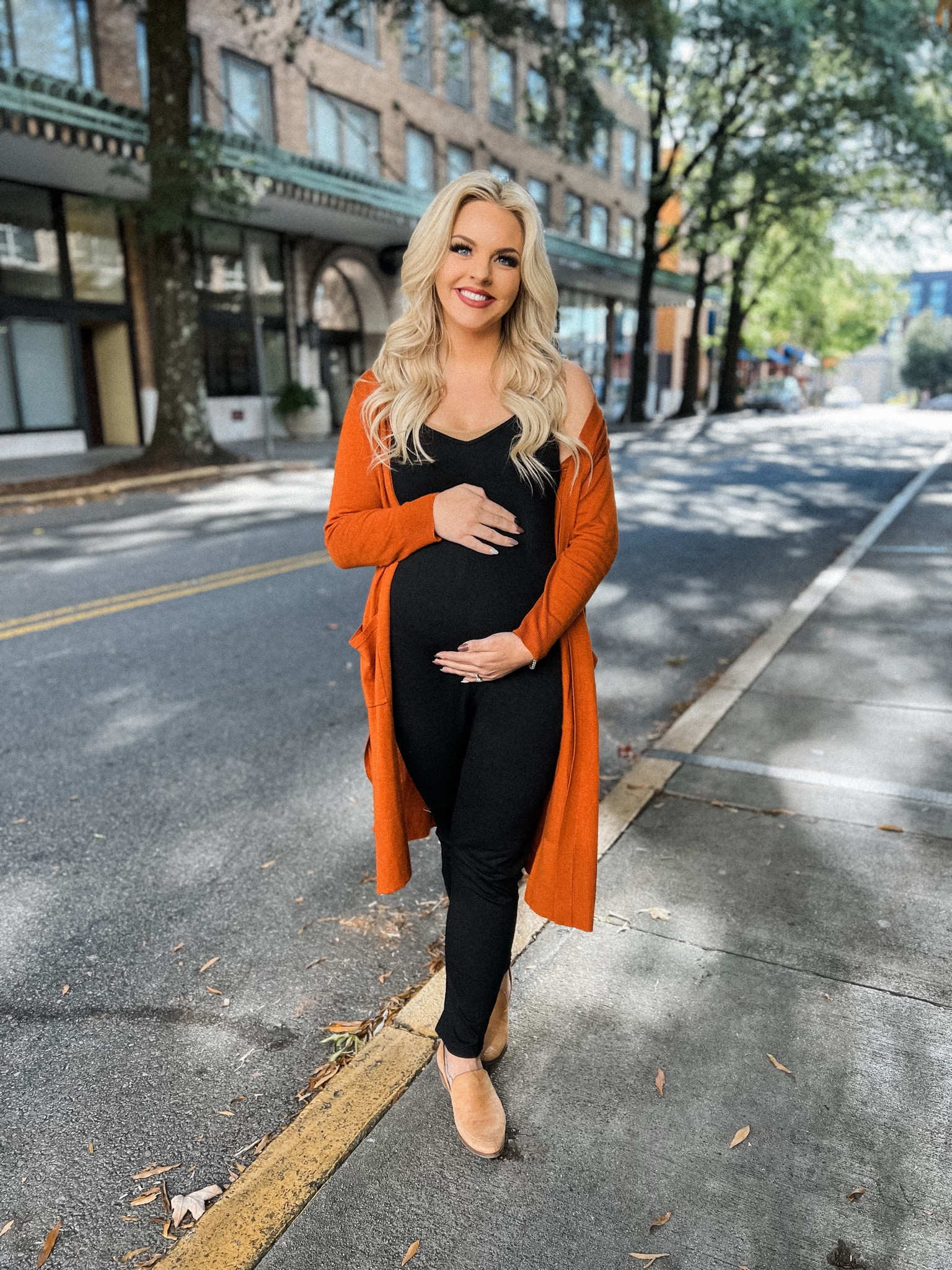 Bump-friendly fall outfit 🍂 black jumpsuit, tan booties, orange duster cardigan

#LTKSeasonal #LTKstyletip #LTKbump