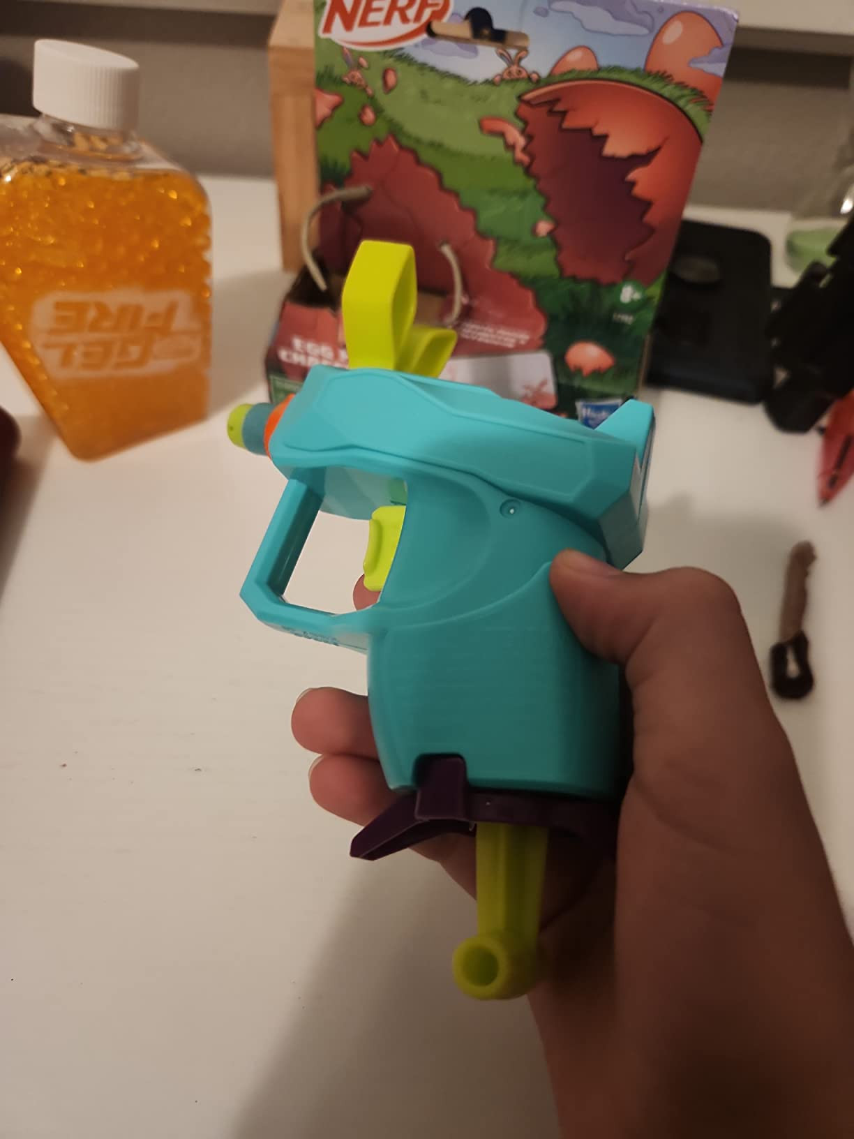 Nerf Elite 2.0 Easter Egg Hunt Blaster, 2 Nerf Elite Darts, Pull to Prime, Spring Toy Foam Blaste... | Amazon (US)