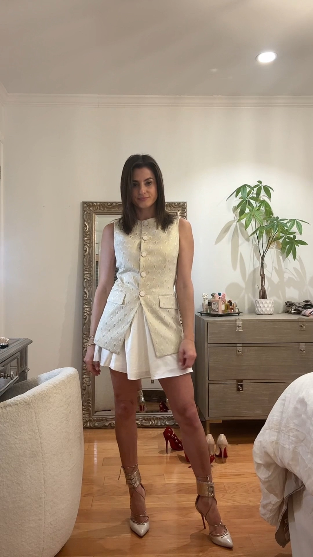 Veronica beard vest and mini skirt Christmas Eve outfit 