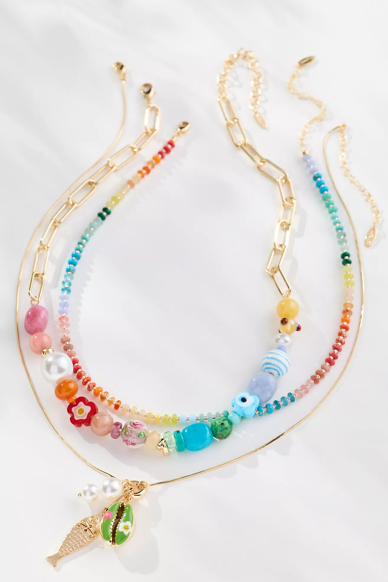 Shades of Sea Layered Necklaces: Charm Edition | Anthropologie (US)