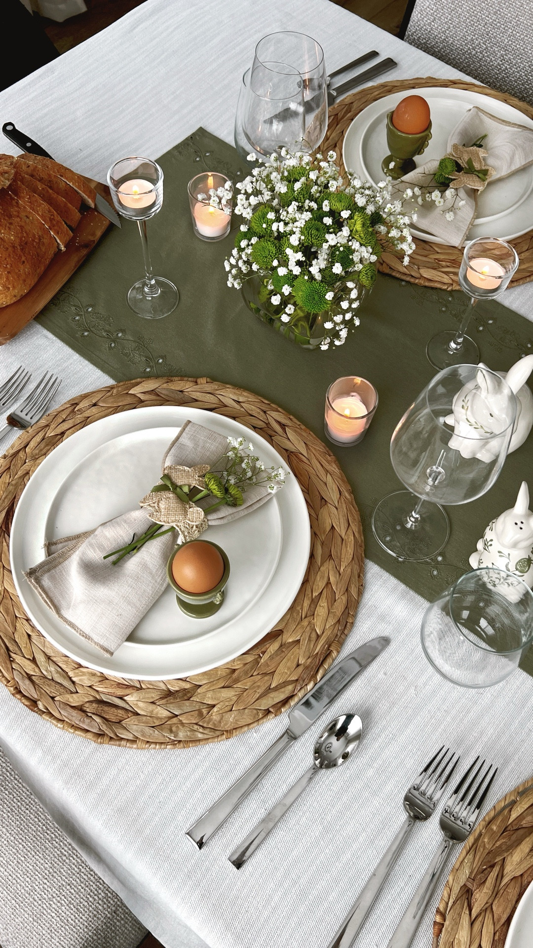 If you are a neutral lover, you will love this neutral Easter tablescape! Neutral table decor, woven placemats, green and beige Easter setting, egg cups, Easter dinner

#LTKSeasonal #LTKSaleAlert #LTKHome