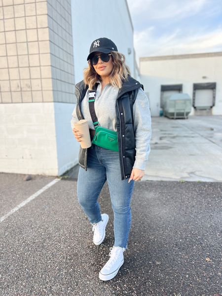 Sweatshirt L 
Vest linked similar 
Jeans 14 - these didn’t have great reviews but I took a chance on them and I love them! Reviews said they have a gap in the waist I didn’t experience that with them. 
Linked similar belt bag. I can’t link mine here but it’s Prada from men’s section. 
#midsize #goodamerican #denim #puffervest #curvy 

#LTKstyletip #LTKunder100 #LTKFind