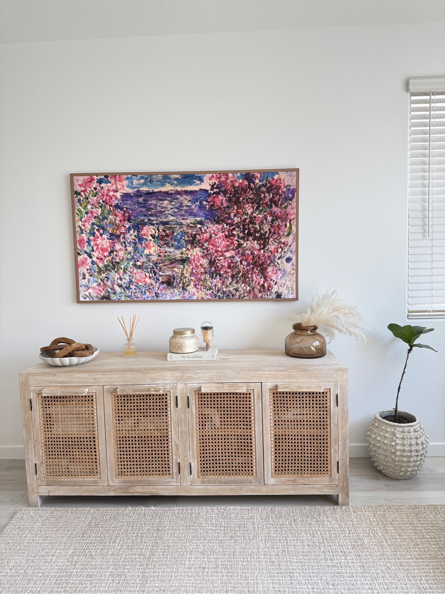 Rattan Media console and Frame TV 

#LTKStyleTip #LTKHome #LTKFindsUnder100