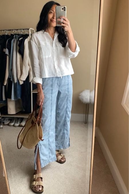 Spring outfit. 
Wide leg pants and linen shirt. 
Denim chambray pull-on pants  
Pants true to size for me, but check reviews as some feel they run small. I’m in the regular length at 5’4. 
Linen shirt true to size. 
Straw bag. Tote bag. Basket bag. 
Slide sandals  

#LTKfindsunder100 #LTKsalealert #LTKover40