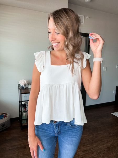 Adorable white tank with ruffle detailing. 

Fits TTS. No stretch to fabric. 

#LTKstyletip #LTKunder50 #LTKFind