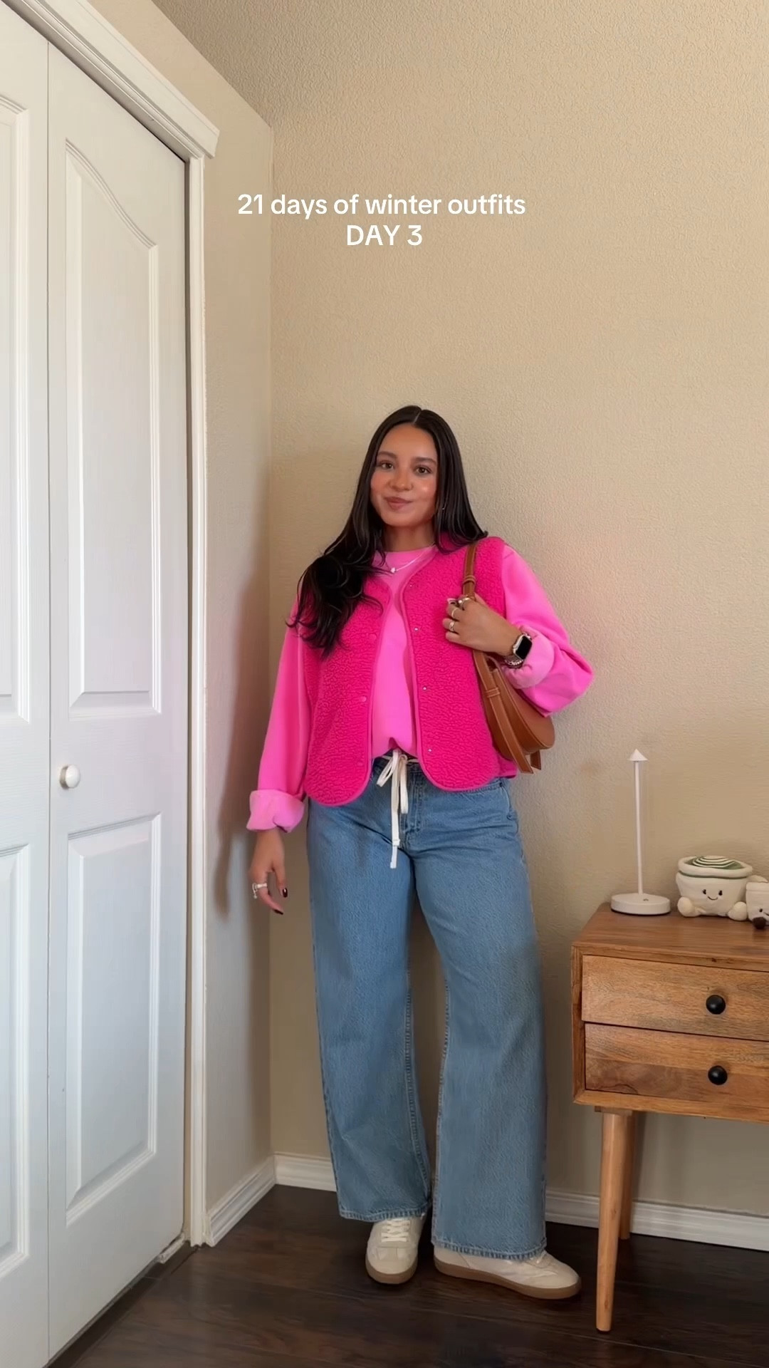 colorful winter ootd🩷❄️ — wearing vest in size x-small + sweatshirt in size medium + jeans in size 2/26s in curve love + bag is polene

#LTKPetite #LTKootd #LTKSeasonal