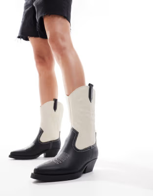 ONLY heeled western boots in black and white contrast | ASOS (Global)