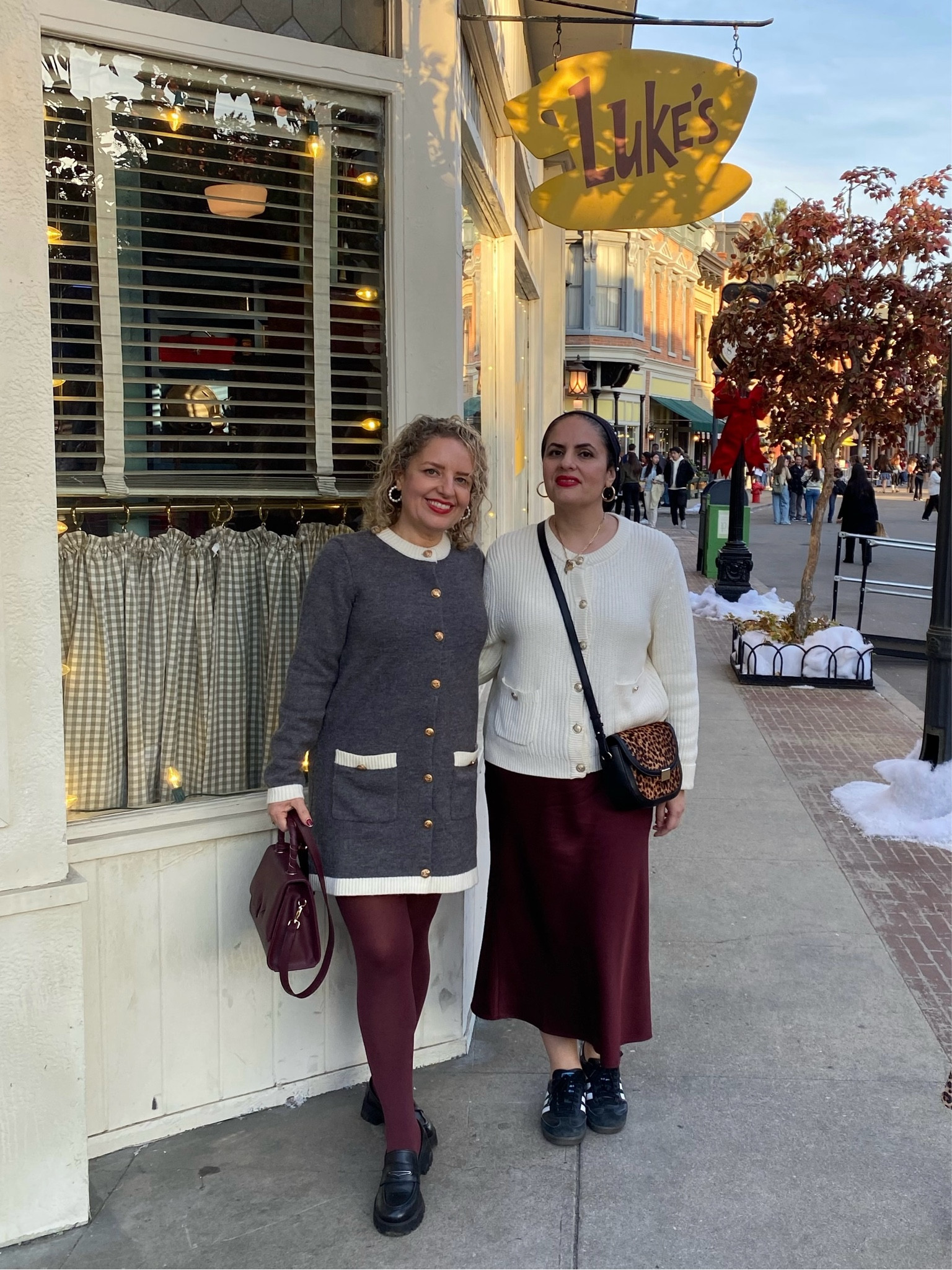 Twinsies, but make it fashion ✨ At the Gilmore Girls set, serving sisterly style:

🖤 I’m wearing: A chic gray @Lulus dress (size L—recommend sizing up!) with white trim and gold buttons giving major Chanel vibes, paired with burgundy tights, a matching bag, and classic black heels.

🍷 She’s wearing: A cozy black beanie, white cardigan, and a stunning burgundy silk slip skirt paired with black-and-white Adidas for that perfect mix of comfy and chic.

Because matching is always better with your sister 💕 #LTKfashion #sisterstyle #GilmoreGirls

#LTKParties #LTKOver40 #LTKFindsUnder50
