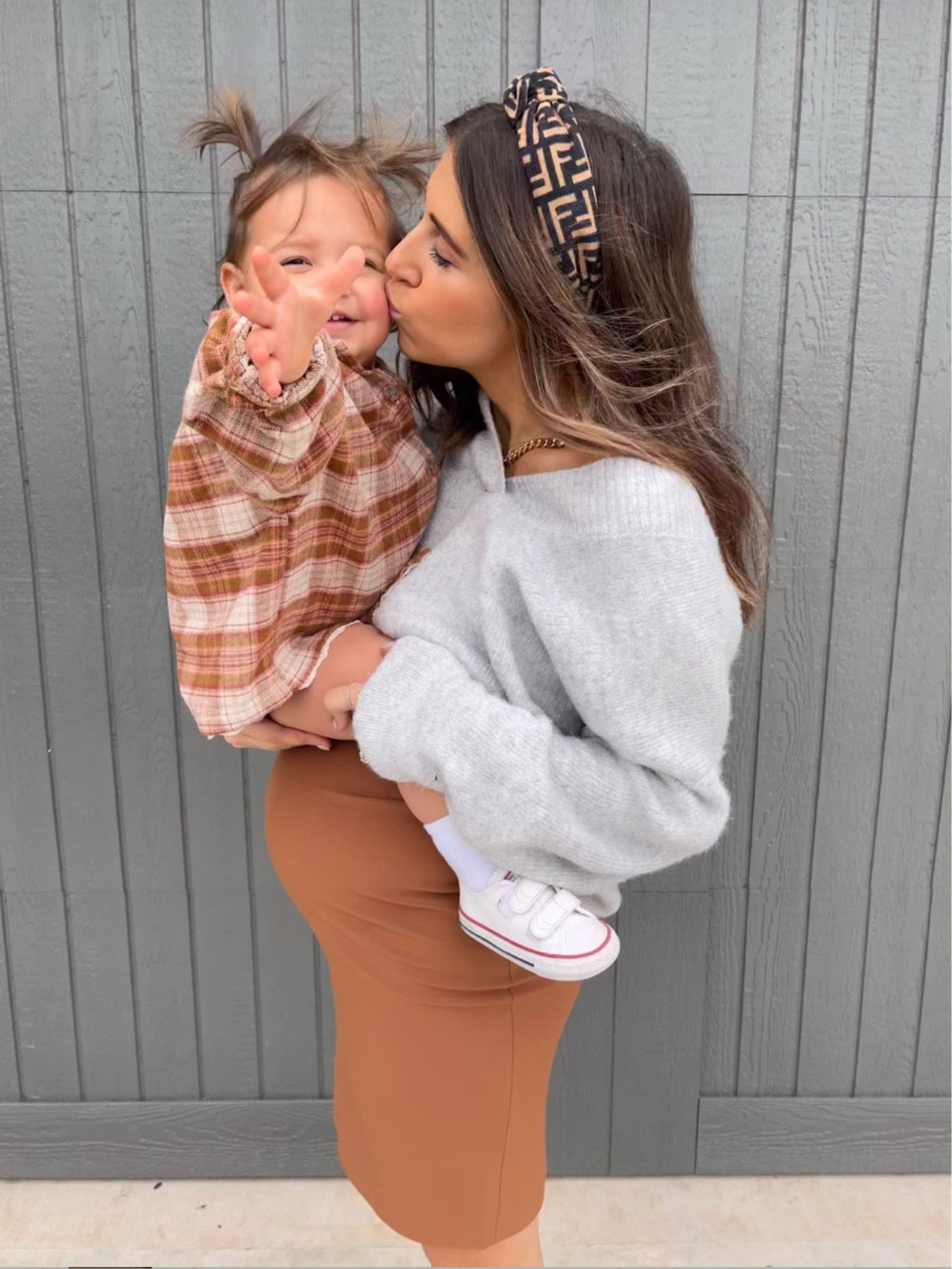 An easy way to style the bump for fall! Throwing a sweater over a dress!