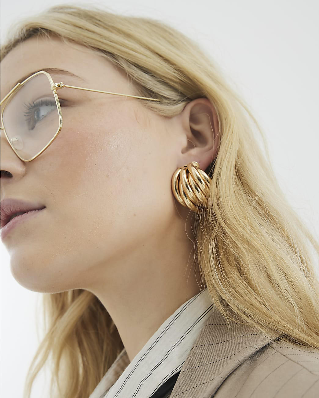 Gold Ridge Detail Stud Earrings | River Island UK & IE