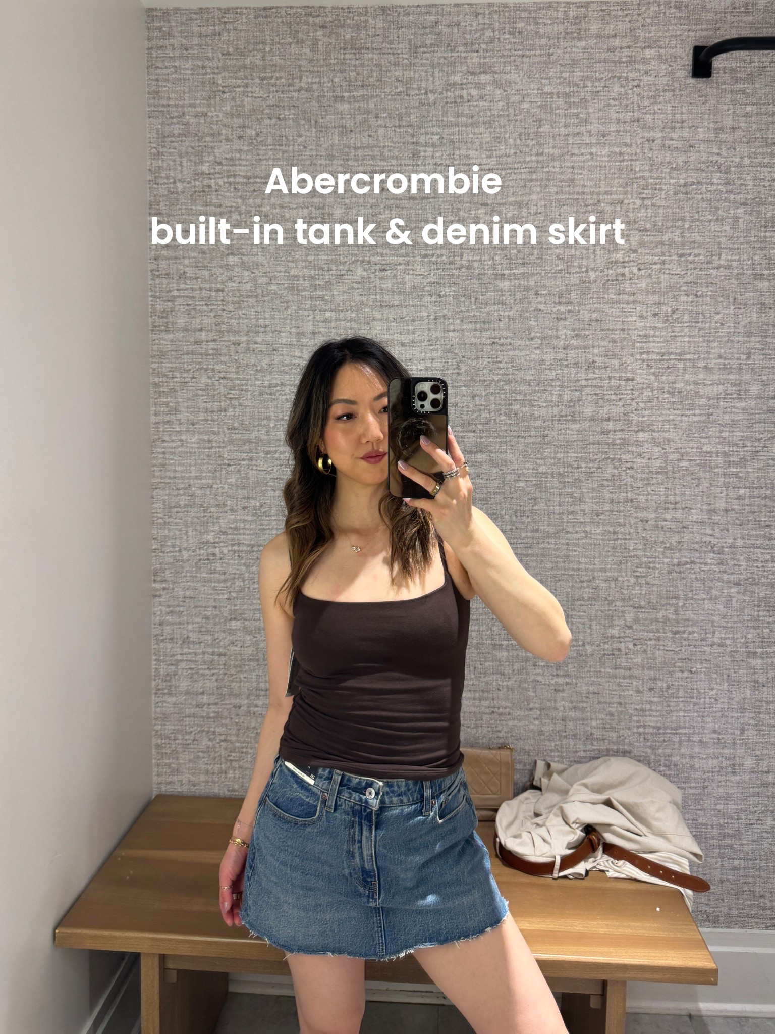 Wearing size XS in the tank, 26 in the denim skirt 