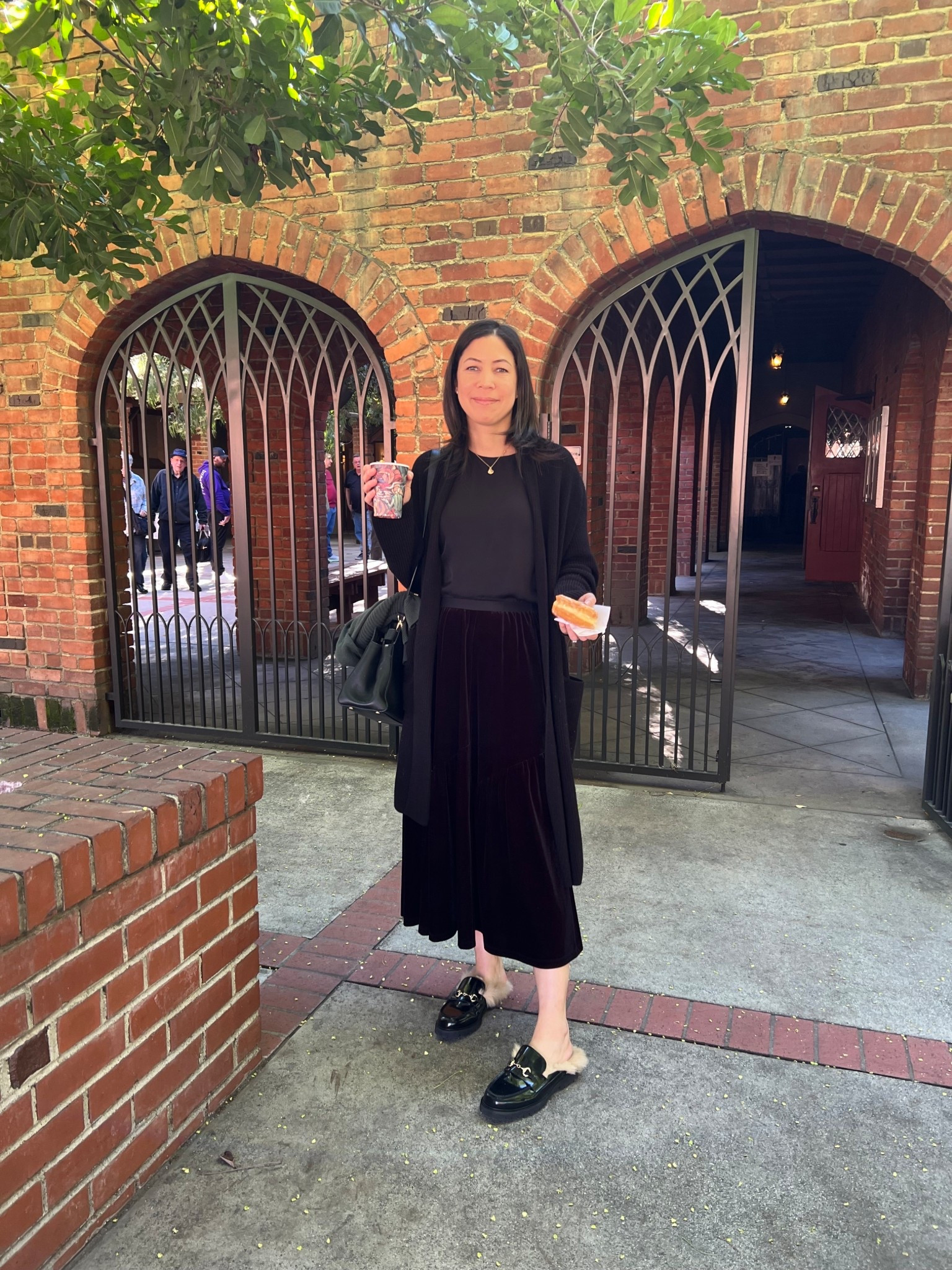Donuts and coffee after church… what could be better? It’s the simple pleasures that make Sundays so sweet.

Today’s look is a cozy-meets-elegant favorite:

🖤 Goelia black velvet midi skirt: so soft and feminine, with that lovely subtle shimmer that velvet brings
🖤 Black silk tee from Quince: effortlessly refined, and perfect for layering
🖤 Quince Australian merino wool duster cardigan: long, elegant, and warm without being bulky
🖤 Thursday Boots Penny Mule: the cozy shearling lining makes these both chic and practical for winter mornings
This outfit combines texture and comfort in the best way,  the velvet skirt elevates the look while the merino wool duster keeps everything relaxed and warm. It’s an example of how elegant basics can still feel special when thoughtfully paired.

✨ Style reflection: When your wardrobe pieces are made of beautiful, high-quality materials, even a simple Sunday outing feels a bit more luxurious.

How are you spending your Sunday? And what’s your favorite cozy-chic combo this season? I’d love to hear. 💬

#OOTD  #CasualChic #TenItemWardrobe 

#LTKootd #LTKmomlife #LTKdayinmylife
