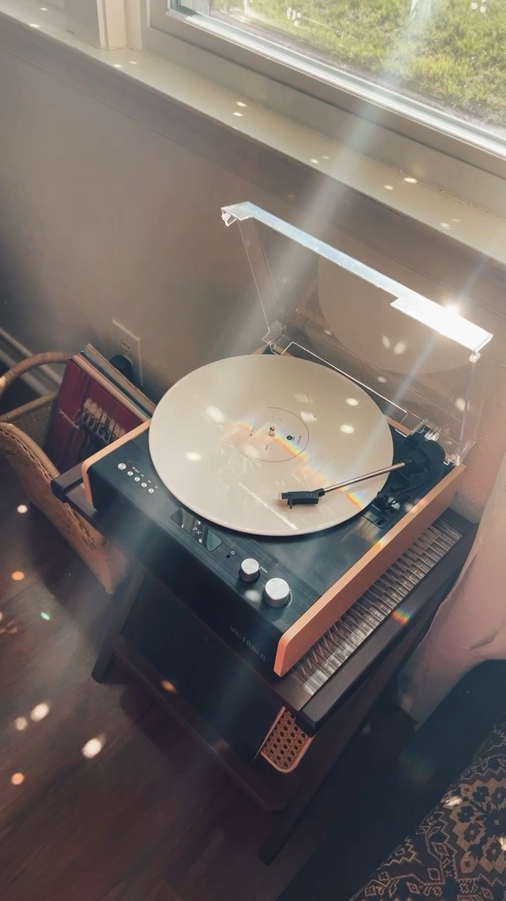 vinyl record player on a budget — works so well! also has bluetooth compatibility. i’m using this neat side table as a record table, i love the front part because it’s like a little ledge for the “currently playing” record. 🎶

#LTKunder50 #LTKhome