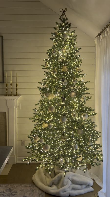 IN LOVE with this Elegant Grand Fir Christmas Tree!!

9 ft Christmas Tree, artificial Christmas tree, dining room decor, fireplace screen, flameless LED taper candles, bow tree topper.
#christmas #homedepot #holiday

#LTKhome #LTKSeasonal #LTKHoliday