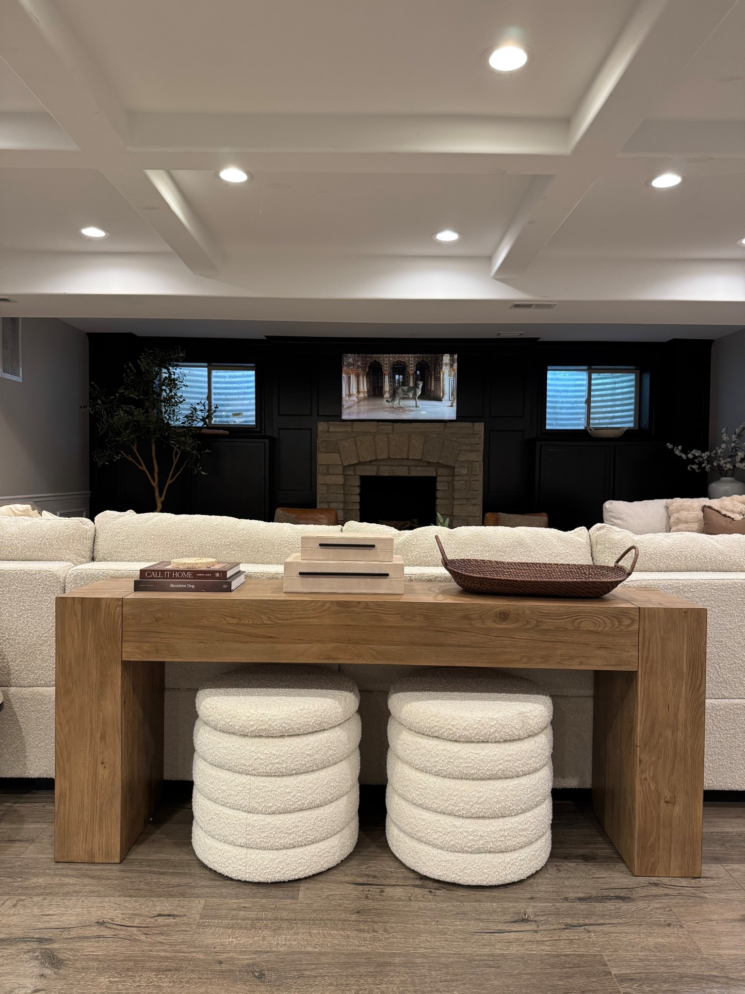 Ottomans are on sale! Console table styling idea! Added this gorgeous wood tone table behind our basement sectional and I am obsessed! 

@wayfair #wayfairfinds #home #homedecor #consoletable #basement #livingroom #amazonhome #storageottoman #jossandmain 

#LTKHome #LTKSeasonal #LTKSaleAlert