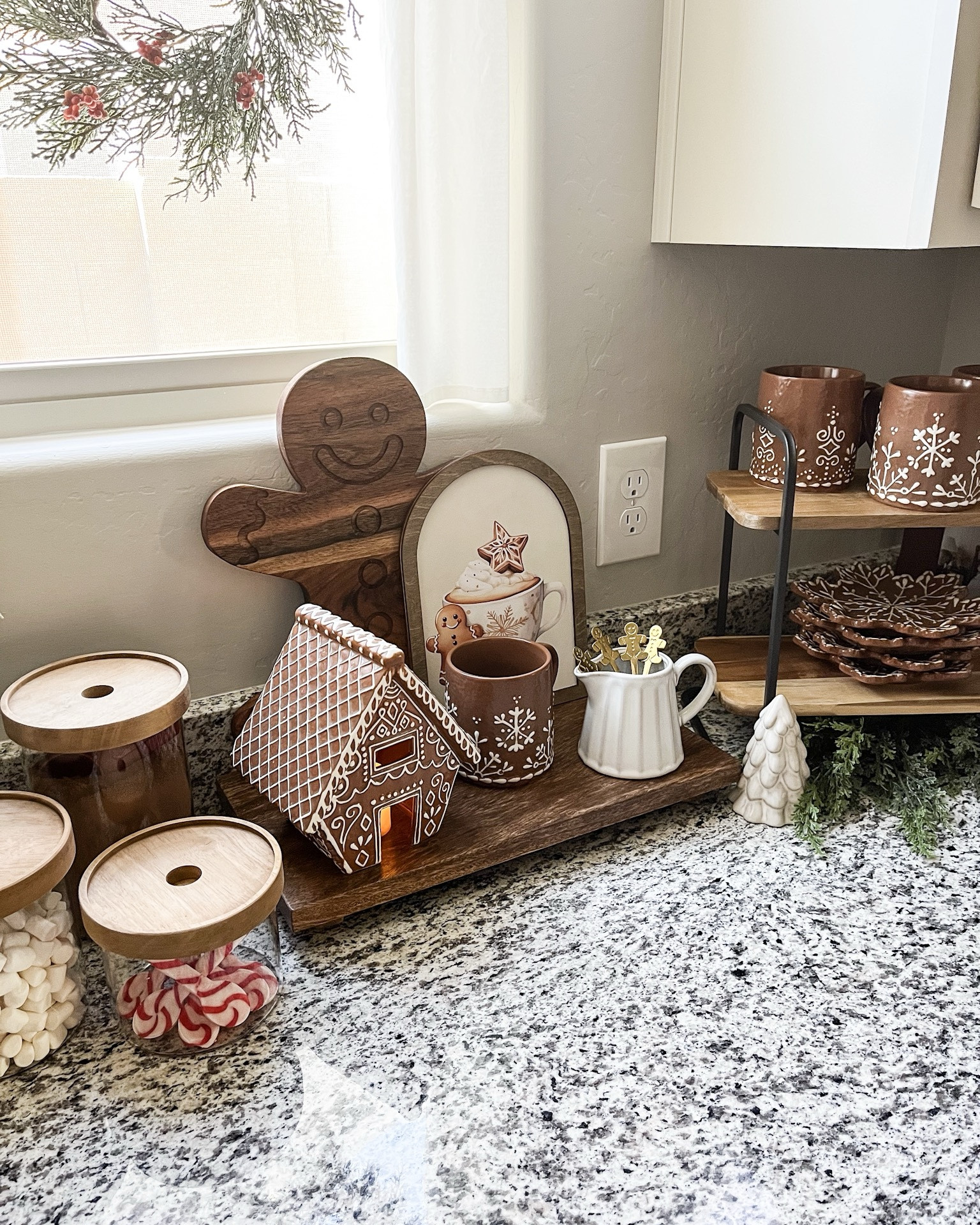 CHRISTMAS cocoa bar!  Follow @lifeinmyarizonahome on Instagram for more holiday ideas and inspiration. 

I had so much fun setting up my Christmas cocoa and coffee bar with these adorable gingerbread pieces.  This is always such a special place to have set up for the holidays…and I’m sharing everything you need to have the perfect festive setup right at home!

For reference I used 6 of the cedar stems in the vase, and 2 under the tiered tray to balance out the greenery. The arch cocoa frame is in the 10x7 size.  Right now the mugs are on sale!

#cocoabar #gingerbreaddecor #christmasdecor #christmaskitchen #hotchocolate 

#LTKSeasonal #LTKHoliday #LTKHome