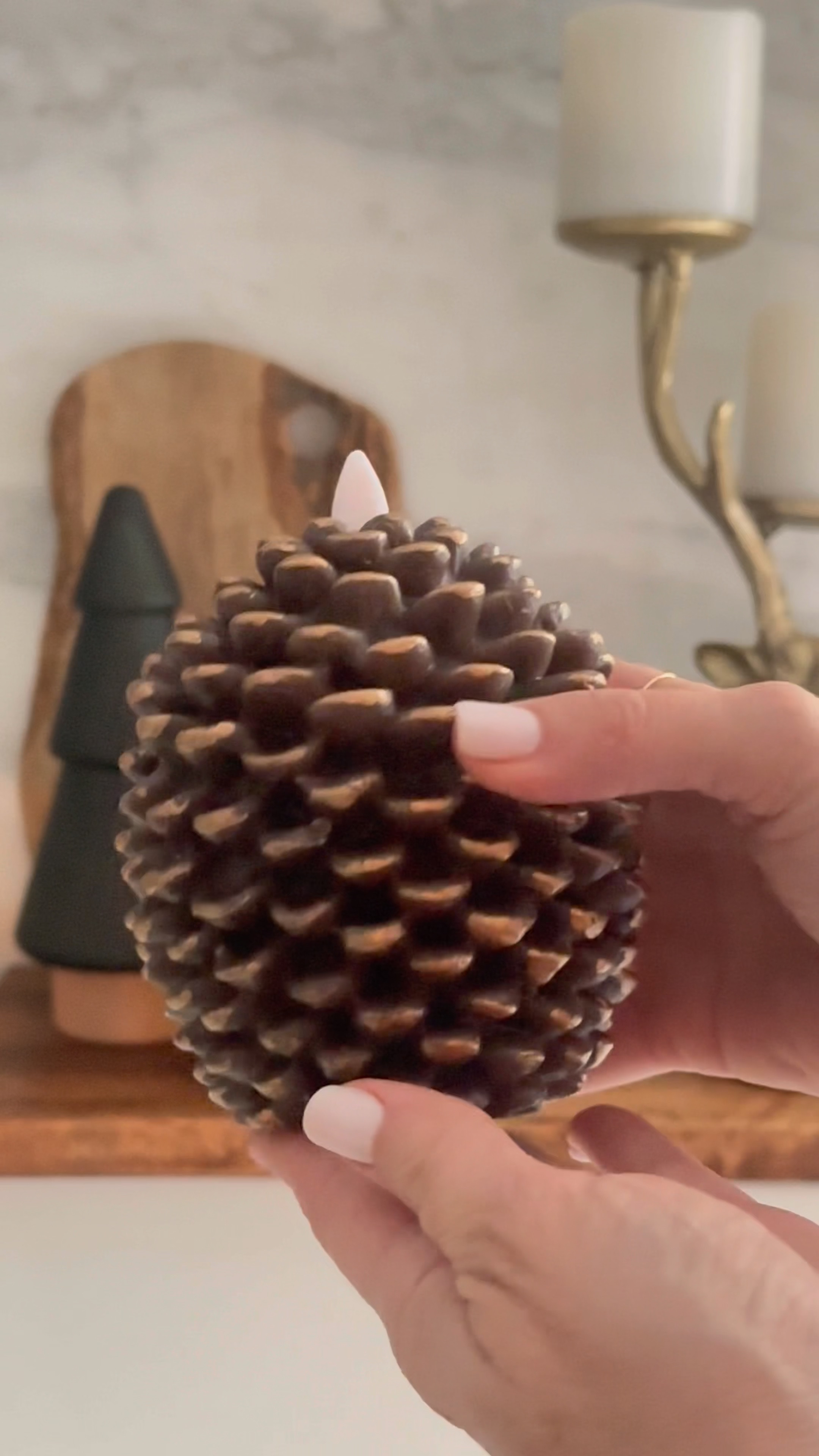 Flameless pinecone light. The perfect addition to your Christmas decor. #Christmasdecor #pineconecandle #flamelesscandle

#LTKHoliday #LTKHome #LTKSeasonal