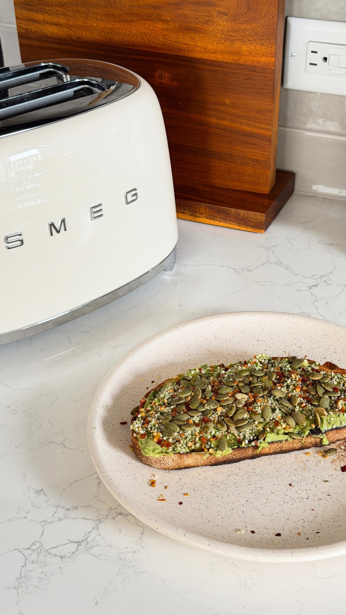 my delicious avocado toast for breakfast this morning :) 

just added hemp hearts, pumpkin seeds, crushed red pepper and a little graza extra virgin olive oil on some sourdough bread. 

toaster is the smeg toaster from crate and barrel 


#LTKHome #LTKdayinmylife #LTKfoodie