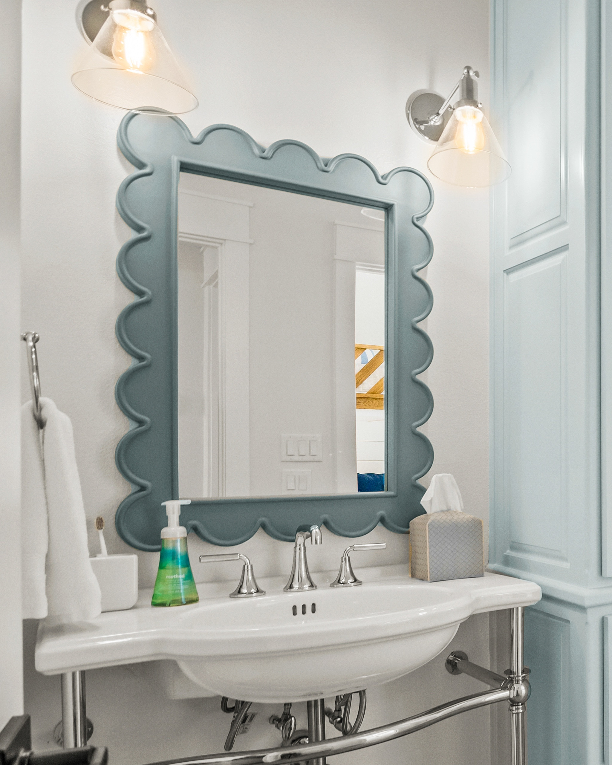 Coastal charm meets timeless elegance. This bathroom gets a major style upgrade with the Hayli Scallop Mirror from Ballard Designs—bringing soft curves and coastal vibes to the space. Plus, it's on sale now, so it’s the perfect time to add this beauty to your home! 
#CoastalBathroom #BathroomGoals #ModernCoastal #HayliScallopMirror #BallardDesigns #CoastalStyle #BathroomInspo #HomeDecorLover #SereneSpaces #BeachHouseVibes #CoastalChic #SaleAlertt 

#LTKHome #LTKSaleAlert
