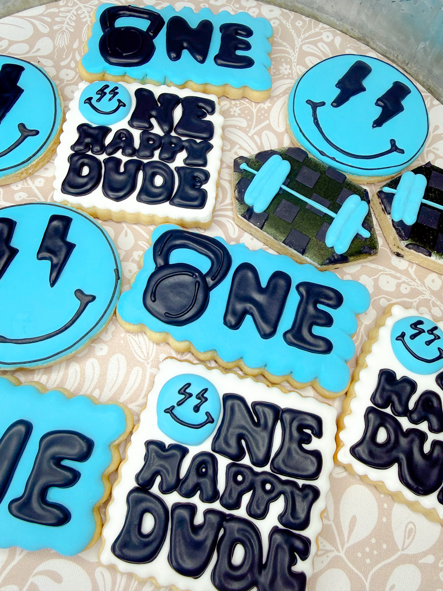 This “One Happy Dude” cookie set was such a fun one to make! 💙 The bright blue, bold black lettering, smiley faces, lightning bolts, and checkered details make it such a cute theme for a boy’s first birthday. Perfect for a dessert table, party favor, or custom birthday treat that matches the whole celebration.

#LTKFamily #LTKKids #BirthdayCookies #FirstBirthday #BoyBirthdayParty #OneHappyDude #CustomCookies #DecoratedCookies #SugarCookies #CookieDecorating #BirthdayPartyIdeas #DessertTable #PartyInspo #KidsBirthdayParty #BoyMomLife 

 #LTKdayinmylife #LTKfoodie #LTKKids