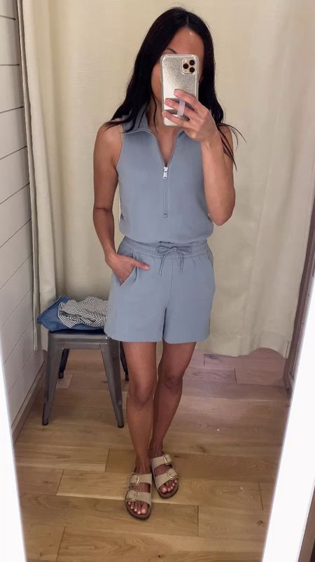 One and done cute athleisure and vacation outfit. 
This sporty romper caught my eye immediately in this beautiful blue color. It also comes in an off-white and black. The fabric looks and feels luxe. Breathable material and would pack well for vacation. 
I sized down, but could have also stayed true to size for a looser fit. 
Slide sandals. 


#LTKOver40 #LTKFindsUnder100 #LTKTravel